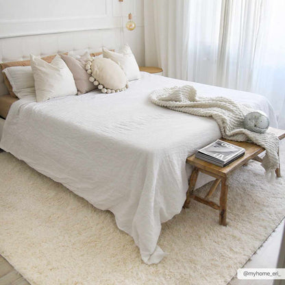 Faina Solid Cream Shag Washable Area Rug - Clearance