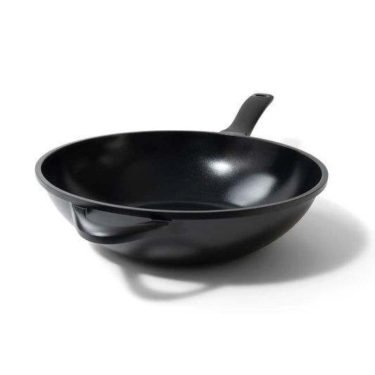 12-inch ceramic nonstick wok with comfort-grip handle filled with stir-fried vegetables